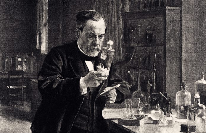 Portrait of Louis Pasteur (1822-1895)in his laboratory.Vintage etching circa late 19th century