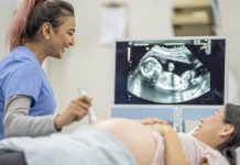 Pregnant Woman at an Ultrasound Appointmentc