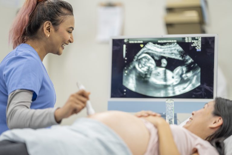 Pregnant Woman at an Ultrasound Appointmentc