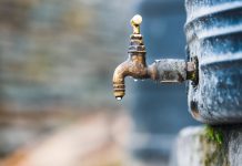 Tap attached to a water tank