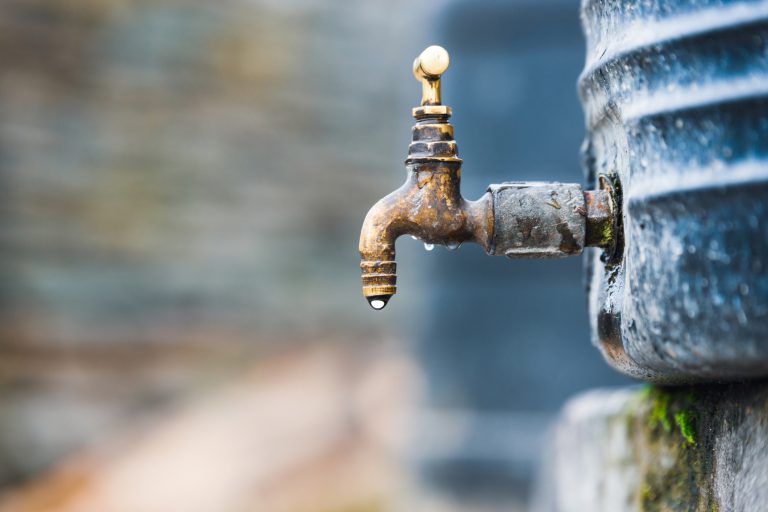 Tap attached to a water tank