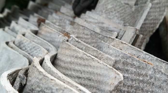 Stack of asbestos roofing sheets. Carcinogenic eternite.