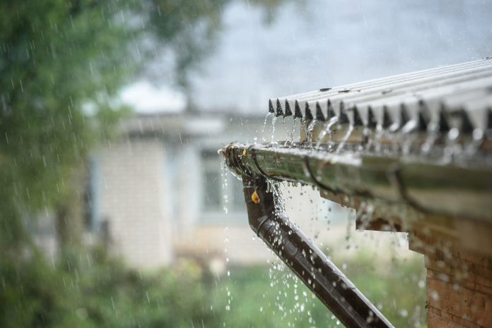 rain flows down from a roof down