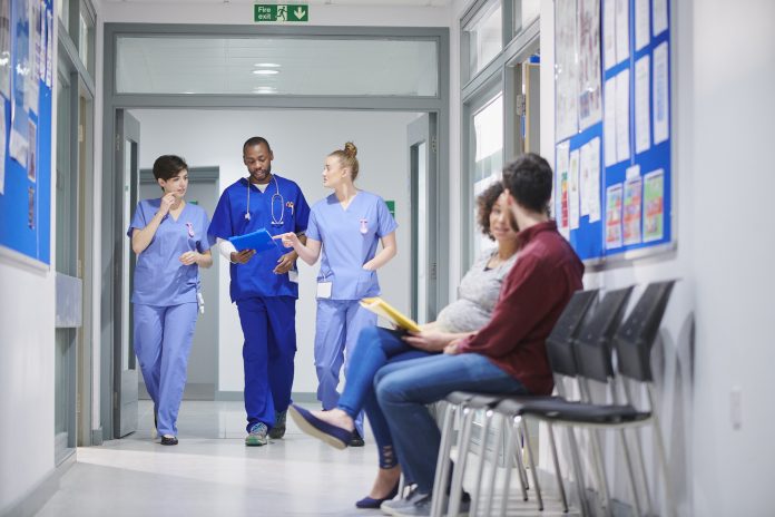 midwifery team walking to theatre