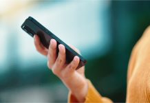 woman on her phone, multi-channel communications