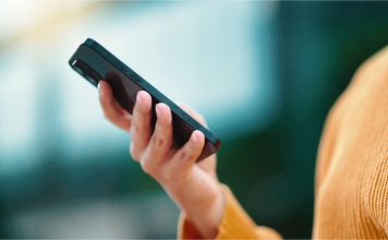 woman on her phone, multi-channel communications