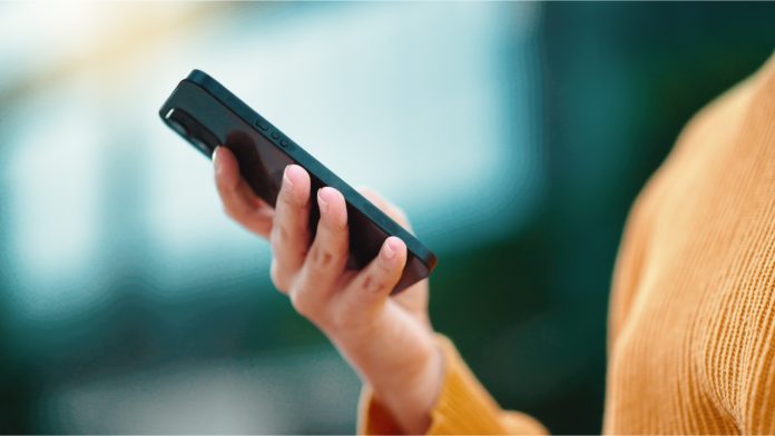 woman on her phone, multi-channel communications