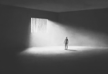 Illustration of prisoner looking the light coming from outside the bars, abstract redemption concept