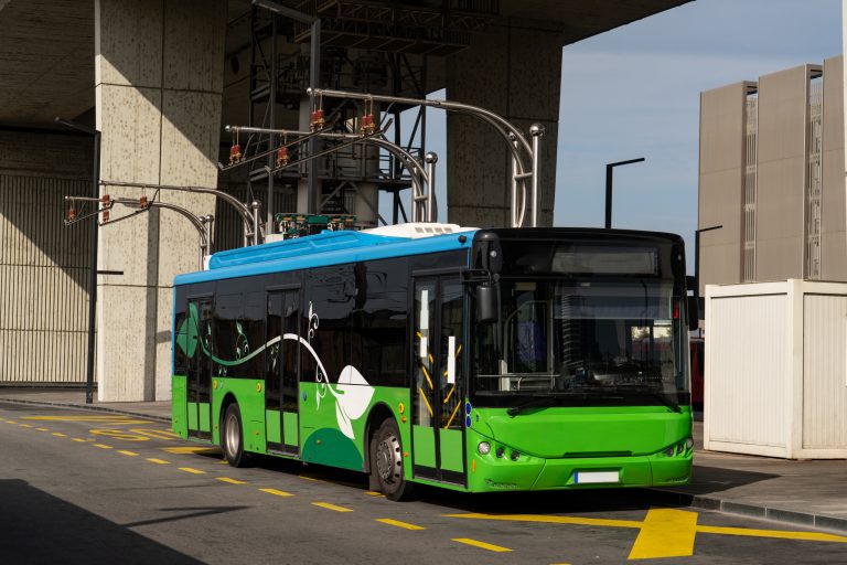 Electric bus charging at the charging pantograph.