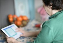 Elderly Woman Using Tablet