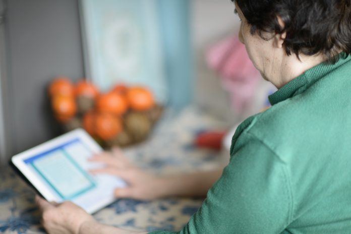 Elderly Woman Using Tablet