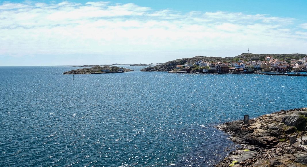 The port of Grundsund, Sweden. Against the backdrop of a picturesque coastal town, the scene captures the rhythmic dance of fishing boats and sailboats, the lively comings and goings of maritime activities, and the enchanting blend of maritime tradition and modern seafaring life. The vibrant colors of the boats, the sounds of water lapping against the docks, and the lively atmosphere of the port showcase the dynamic heart of Grundsund, inviting viewers to immerse themselves in the charm of this coastal gem.