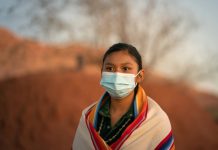 Navajo teenager portrait wearing a face mask during covid-19 pandemic