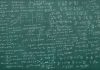 Blackboard full of equations (quantum, relativty....)