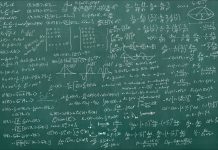 Blackboard full of equations (quantum, relativty....)