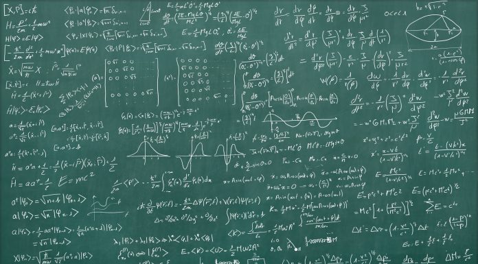 Blackboard full of equations (quantum, relativty....)