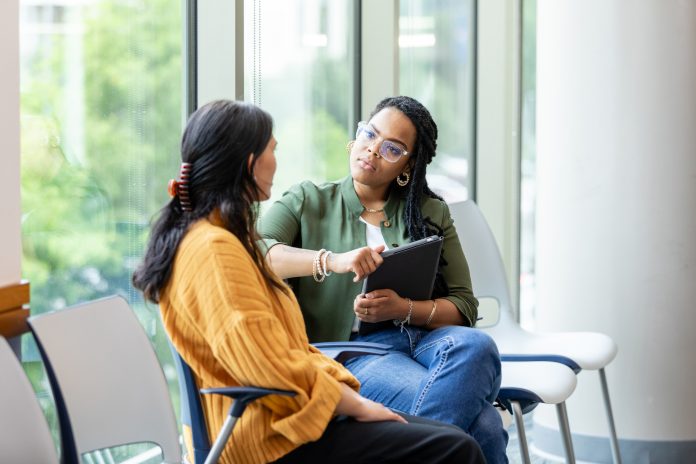 Vulnerable woman shares something with therapist during therapy session