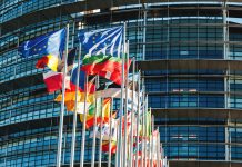 Strasbourg, France - January 28, 2014: All EU members flags in front of the European Parliament in Strasbourg, France