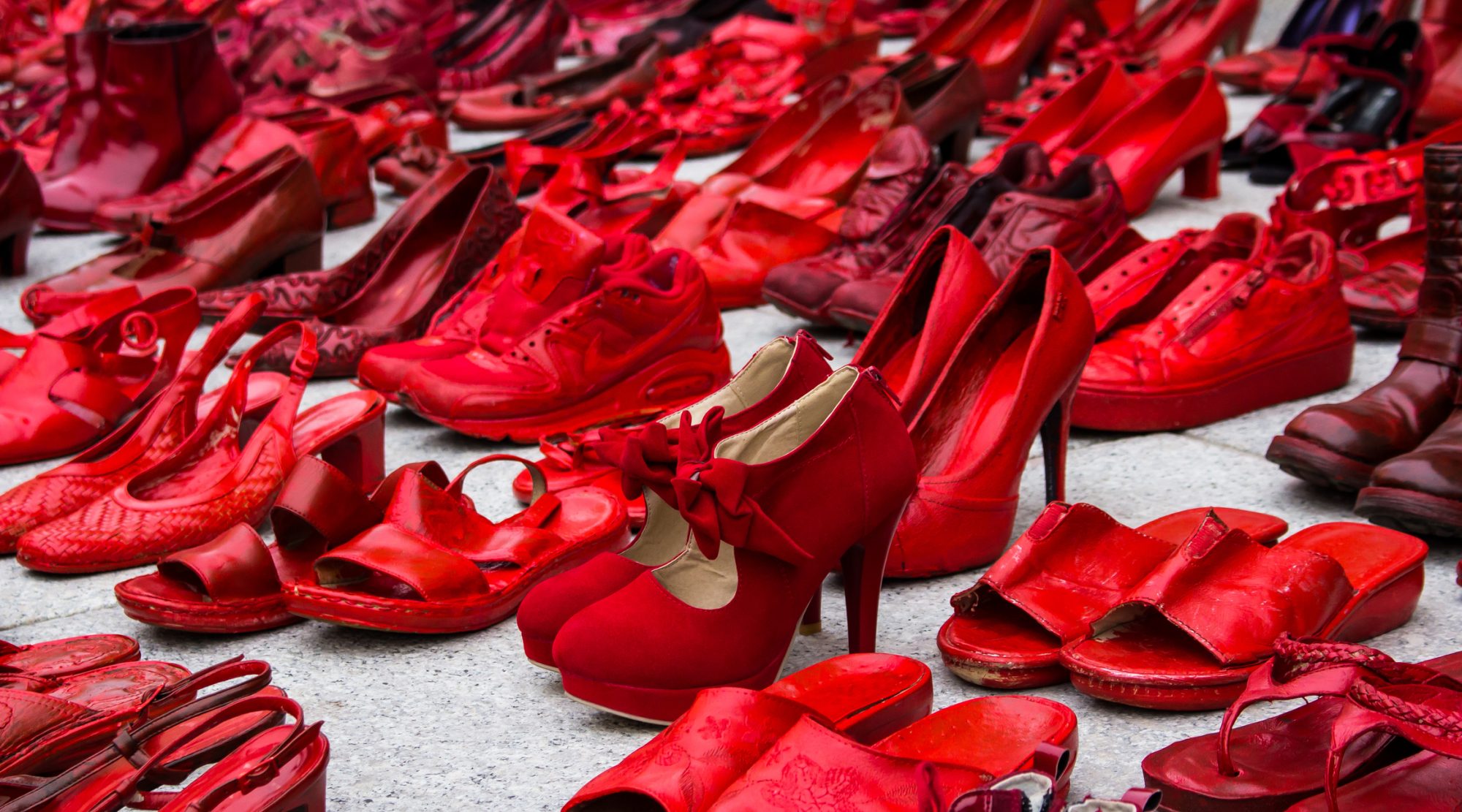 CAGLIARI, ITALY - NOVEMBER 25, 2017: Zapatos rojos by Elina Chauvet near Piazza Garibaldi - Sardinia