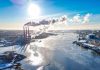 On the left is an aerial view of Halifax Harbour with a local power plant, as indicated by the three cooling towers. Credit: Noah James Media