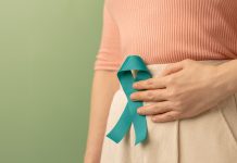 Ovarian and Cervical Cancer Awareness. Woman Holding Teal Ribbon on Lower Abdomen, Uterus, Female Reproductive System, Women's Health, PCOS and Gynecology