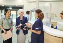 medical administrator with female doctor and ward nurse