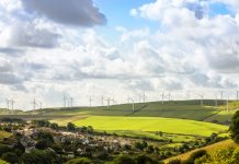 Long range view of wind turbines in the countryside