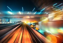 abstract motion-blurred view from the front of a train in Tokio, Japan