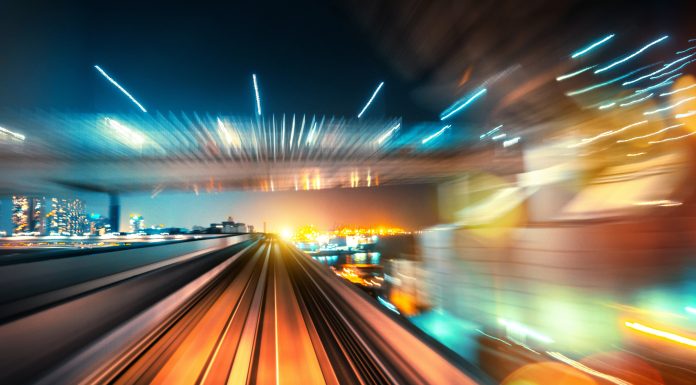 abstract motion-blurred view from the front of a train in Tokio, Japan