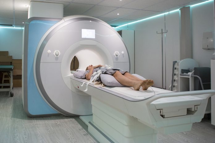 Female patient lying for an MRI Scan