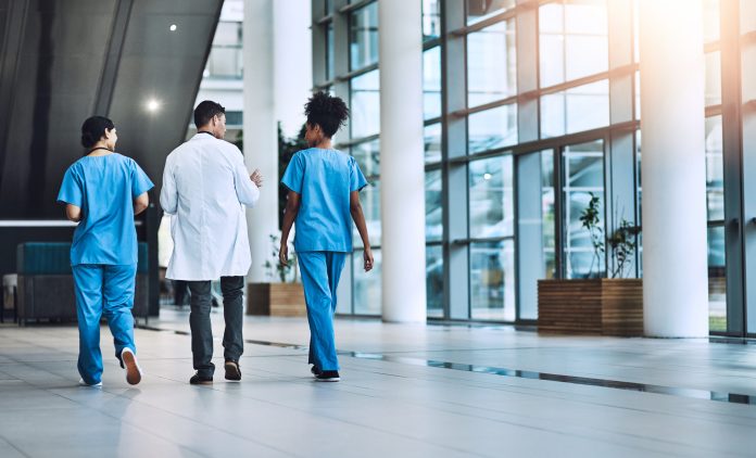 Shot of medical practitioners having a conversation in a hospital