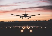 Aircraft landing at sunrise