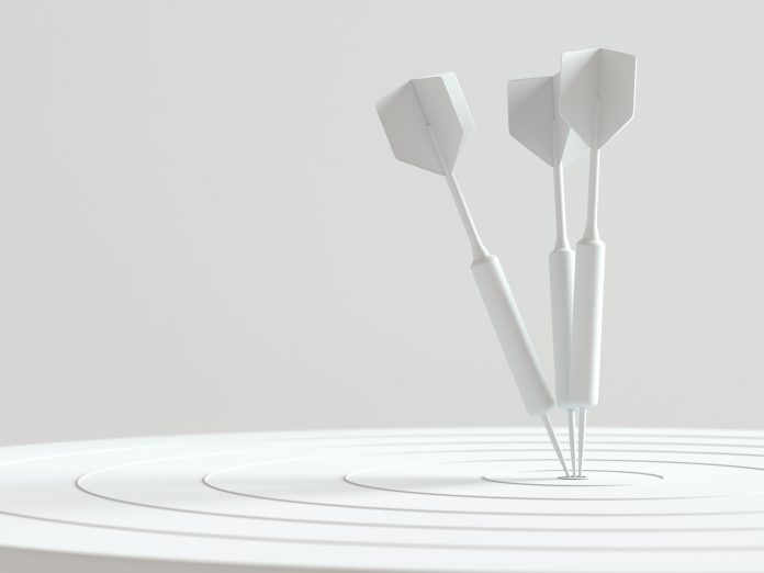 Darts hitting in the target center with copy space for your text, Minimal concept, 3d render.