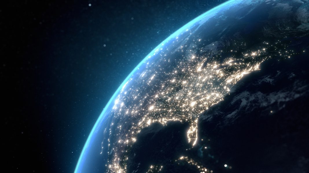 Flying over USA at night with city light illumination. View from space. 3D render