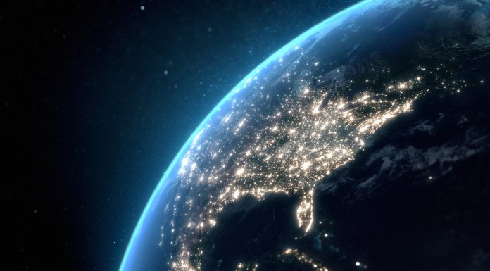 Flying over USA at night with city light illumination. View from space. 3D render