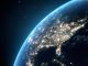 Flying over USA at night with city light illumination. View from space. 3D render