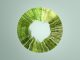 Abstract circular green carpet woven from particles, representing circular economy and regenerative energy, CGI.