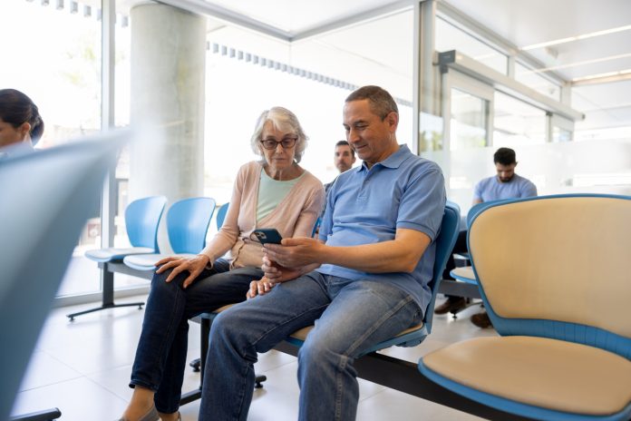 Senior woman with a companion in the waiting room at the hospital