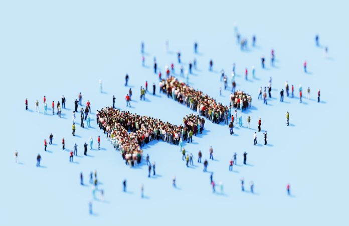 Human crowd forming AI blue background. Horizontal composition with copy space.