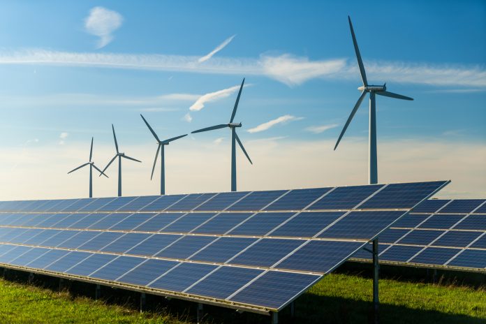 Wind turbine and solar panels energy generators on wind farm