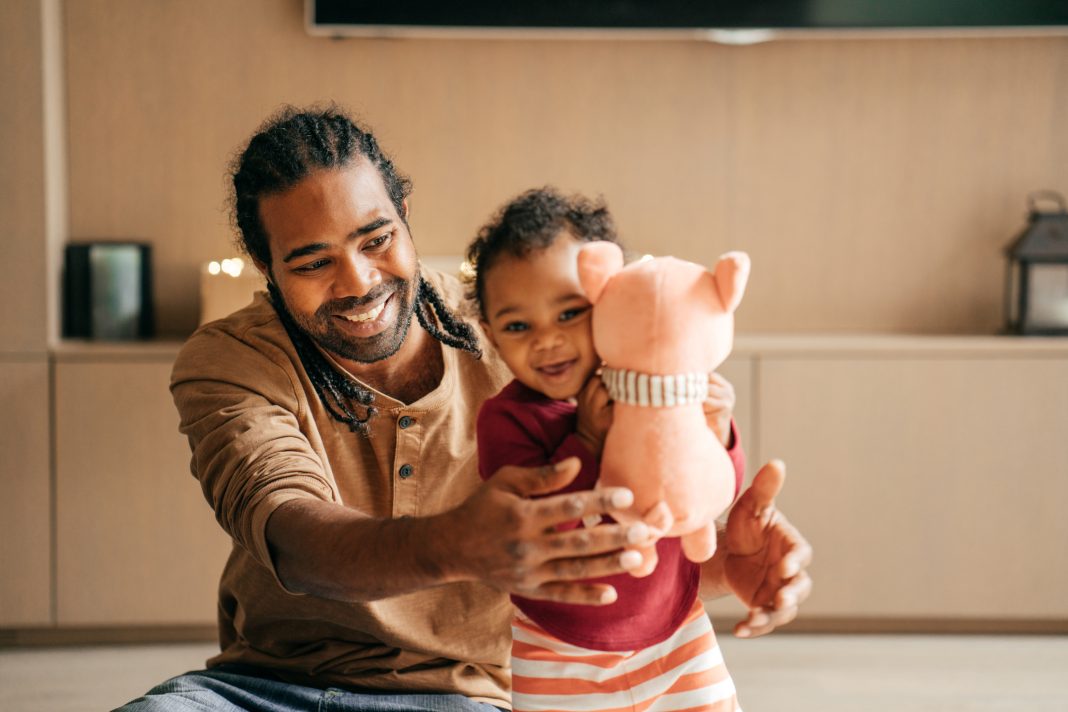 Happy dad and baby daughter