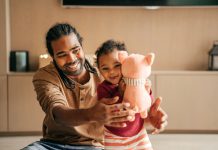 Happy dad and baby daughter