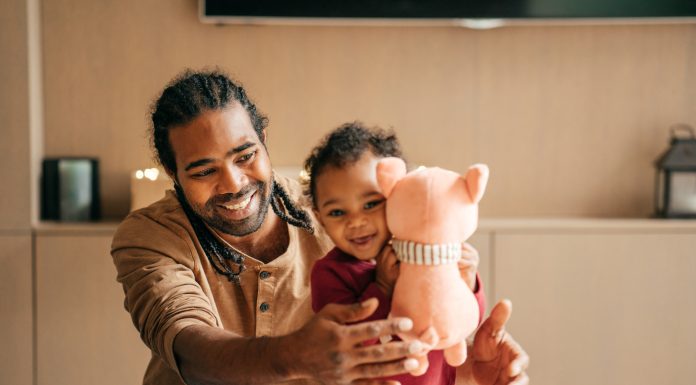 Happy dad and baby daughter