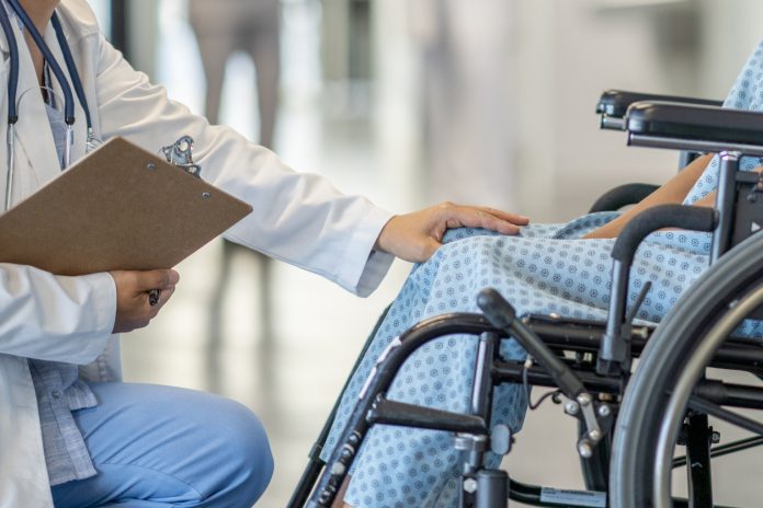 Girl in a wheelchair gets treatment