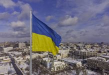 Ukrainian flag in the wind. Blue Yellow flag in the city of Kharkov