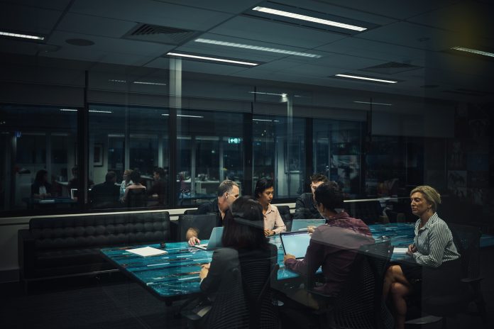 Shot of a group of businesspeople having a boardroom meeting in an office